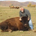 Hunter Holding Buffalo Head Up